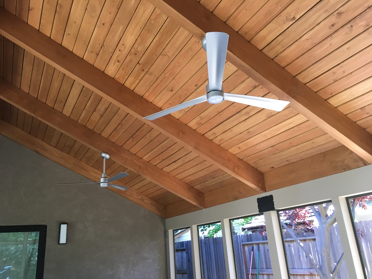 Cedar plank ceiling and exposed rafters in a Placer County sunroom addition